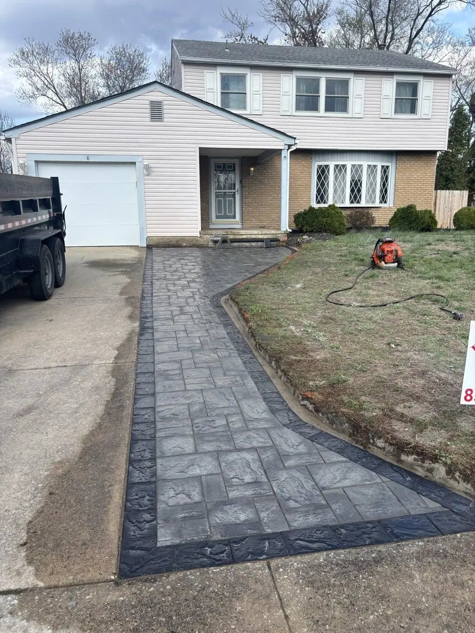 New paver walkway with a contrasting border installed at a home in Washington Township, NJ